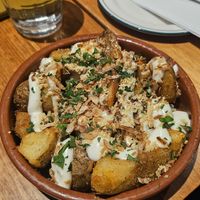 Loaded potatoes, needed more sauce at Bam Bam Italian in Avonsleigh