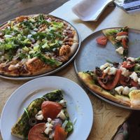 Vegan Big Mac pizza and Mediterranean  at Woodshed in Sidney