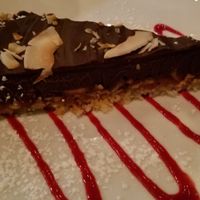 Chocolate Tart on GF coconut crust. at Wild Goat Bistro in Petaluma