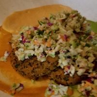 Quinoa sweet potato cakes ~ Brussel sprout slaw, hummus, roasted red pepper and creamy cashew sauce.  at Wild Goat Bistro in Petaluma