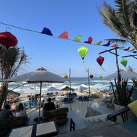View of the beach (can also use the deckchairs on the beach)   at The Fisherman Vegan Restaurant   in Hoi An