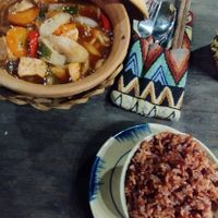 Braised tofu and mushroom in clay pot with red rice, so yum! at The Fisherman Vegan Restaurant   in Hoi An