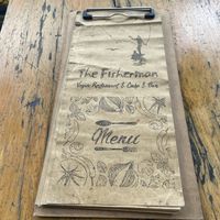 Front of menu  at The Fisherman Vegan Restaurant   in Hoi An