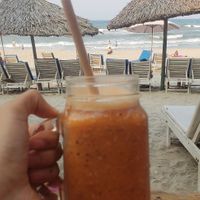 yummy smoothie and a great view at The Fisherman Vegan Restaurant   in Hoi An