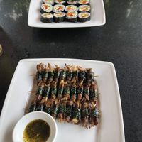Korean sushi (top); grilled mushrooms in piper lollot leaves (bottom)  at Phong Nha Vegan in Phong Nha