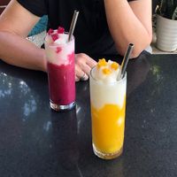 banana and dragonfruit smoothie; mango and coconut smoothie  at Phong Nha Vegan in Phong Nha
