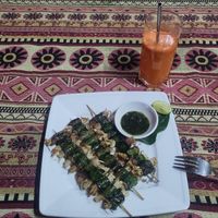 awesome dish with enoki mushrooms and mock meat at Phong Nha Vegan in Phong Nha