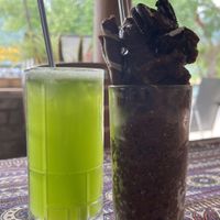 Cucumber juice, cookie smoothie - ordered without milk, pretty sure the wafer sticks are not vegan though.😒 at Phong Nha Vegan in Phong Nha