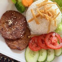 Pork with steamed ricee  at Phong Nha Vegan in Phong Nha