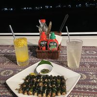 View (in the night) with passion fruit soda (left) and lemonade (right)  at Phong Nha Vegan in Phong Nha
