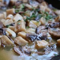 Puntas de soja al ajillo  at Raices in Granada