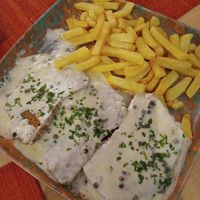 Seitan con salsa de pimienta at Raices in Granada