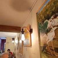 Tienen también cuadros expuestos, que están a la venta. at Raices in Granada