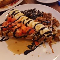 Lotus biscuits, banana, strawberry, maple syrup and some Oreos on top at Cafe Waffle in Prague