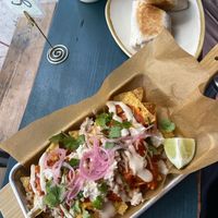 Moody chilaquiles and cauli & smoked tofu wrap   at Old Crow Coffee Co. & Moodswing Coffee in New Westminster