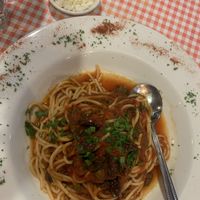 Spaghetti puttanesca, delicious! Added the vegan cheese at Arrivederci Pizzeria in Milton