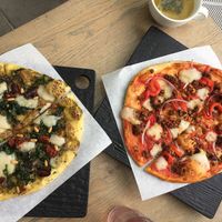 Sweet Pepper+Sausage and Ultraviolet pizzas at Virtuous Pie - UBC in Vancouver