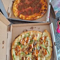 Pepperoni without cheese and buffalo cauliflower pizza at Virtuous Pie - UBC in Vancouver