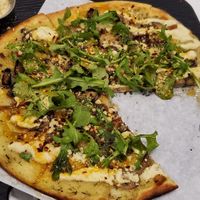 SuperFunghi pizza -so delicious we ate a piece before remembering to take a pic at Virtuous Pie - UBC in Vancouver