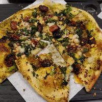 Ultraviolet pizza  -so delicious we ate a bite before remembering to take a pic at Virtuous Pie - UBC in Vancouver