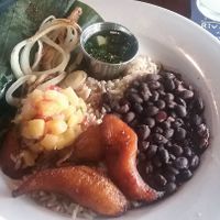 "Key West Banana Leaf" meal on their Blue Zone Menu. It has sweet plantains, black beans, steamed rice, pineapple salsa, onions and chimichurri sauce. (which tasted like pesto) at Riverwalk at Tin City in Naples
