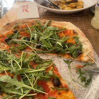 Marinara pizza with rocket & olives  at Spiga in Alicante