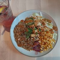 Lunch bowl of the day (tofu, quinoa, peanut butter sauce), homemade lemonade at RoseHip Vegan Kebabs in Vilnius
