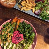 Pink hummus bowl and portabello burger! at RoseHip Vegan Kebabs in Vilnius