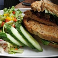 vegan sausage sandwich at Roots Lounge in Bristol