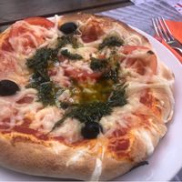 tivoli pizza: vegan cheese, olives, fresh tomato, fresh basil with olive oil at Pizzeria Parma in Ljubljana