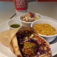 falafel pita with turmeric rice and potato salad. (Asked for no tzatziki and feta on pita) at Zoës Kitchen in Naples