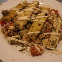 Sautéed Bulgur with Vegetables, Seitan, Tofu and Tamari Sauce - the bulgur was quite good. The dish was a bit bland though. On top they put slices of Quiche -don't recommend it at Bar Ecologico Gaia in Sevilla