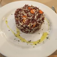 Paella with carrots, onion and mushrooms.  at Bar Ecologico Gaia in Sevilla