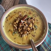 Yellow Dahl with amazing seasonings. Dee, so good !  at Royal Clay Oven in Krabi