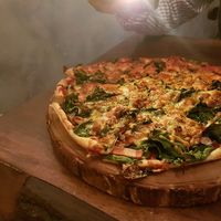 beet pizza with a crispy pastry base. vegan cheese option available! at Monk's Butcher - Itaewon in Seoul