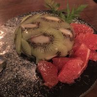 Chocolate mousse hidden underneath the nicely arranged kiwi fan at Monk's Butcher - Itaewon in Seoul