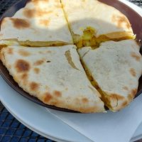 Bread with potatoes and raw onion at Indian and Nepalese Restaurant Om in Znojmo