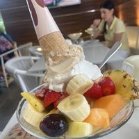 Obstsalat und 2 Kugeln Eis (Soja, Haselnuss, Banane) aus der Kantine (selbst zusammen gemixt)   at Bar Gelateria Flora in Riva Del Garda