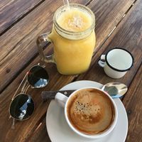 Pina colada smoothie and americano with coconut milk  at Natural Juice in Tulum