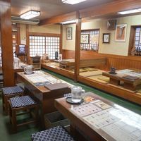 Choose from chairs at tables, or take off your shoes to sit on tatami mats. at Flowers - Tachibana in Hiroshima