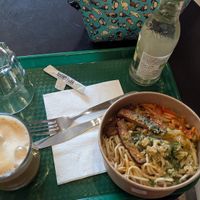 Tofu noodle bowl and vegan latte at Organic Epicerie in Chamonix-mont-blanc