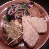 Vegan lasagna served with garlic bread and salad at Kaffi Krus in Selfoss