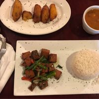 Vegan fried pork, red beans, rice, maduros at Lechonera El Coqui in Jacksonville