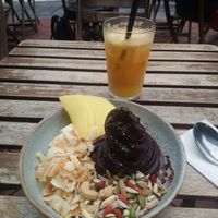 Açai bowl and fresh orange juice. at Sarnies in Central Singapore