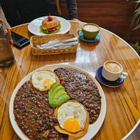 Oat milk coffee, huevos rancheros at Cafe de Nucallacta in Cuenca