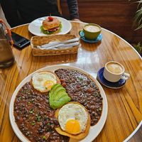 Oat milk coffee, huevos rancheros at Cafe de Nucallacta in Cuenca