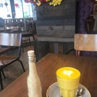 Tumeric latte which comes with almond milk and can be made with or without coffee at Wild Honey - Mandarin Gallery in Central Singapore