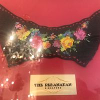 Artwork with beading at The Peranakan in Central Singapore