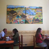 There's a room with regular chairs and tables available and one where you can sit at tables on the floor.  at Govindas Hare Krishna in Valparaiso