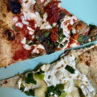 Vegan eggplant, olives and harissa pesto pizza (top). Vegan potato, fennel and scallion pizza (below).  at Pizza Madre in Marrickville